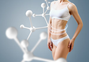 woman with perfect body near molecule chain. slimming concept.