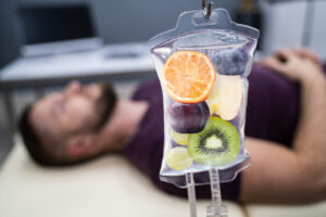 fruit slices inside saline bag hanging in hospital